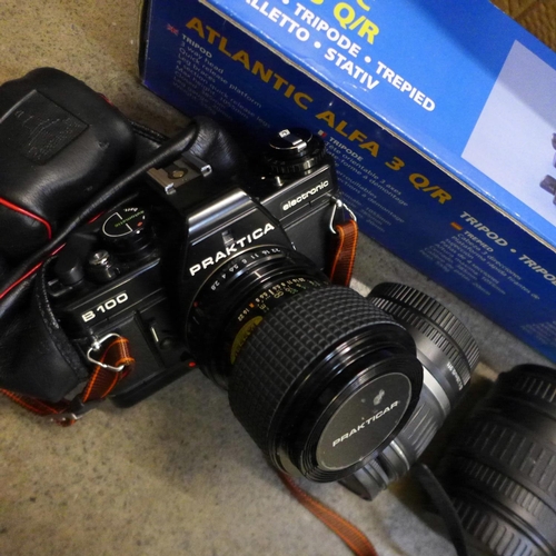 865 - A Praktica B100 35mm camera, Jessops tripod, Pentax and Ricoh cameras, a Canon 18-55mm zoom lens, a ... 