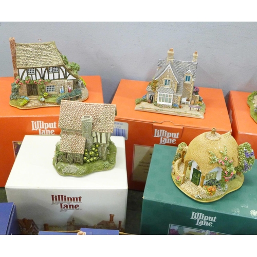 882 - Fourteen Lilliput Lane cottages, all boxed, most with certificates, including Apothecary, Thimble Co... 