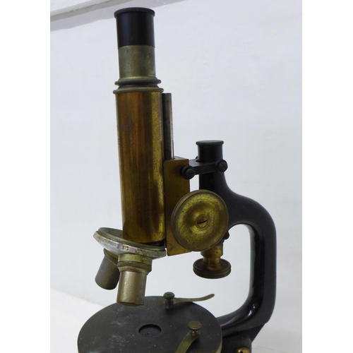 887 - A C. Reichert microscope