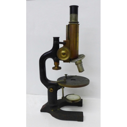 887 - A C. Reichert microscope