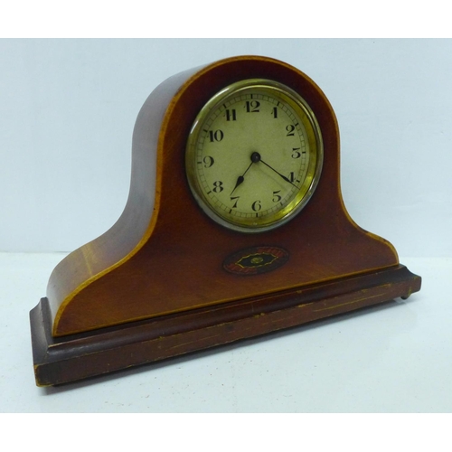 904 - An inlaid mantel clock, brass bezel