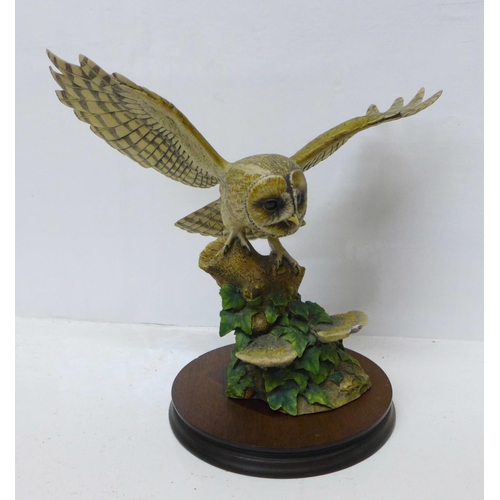 906 - A Border Fine Arts figure of an owl in flight (wing restored)