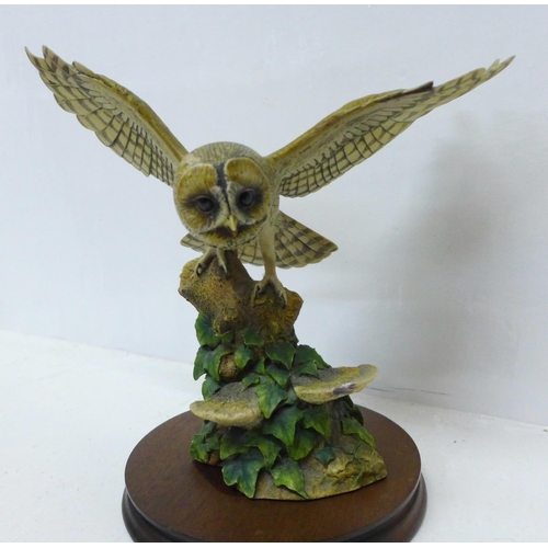 906 - A Border Fine Arts figure of an owl in flight (wing restored)