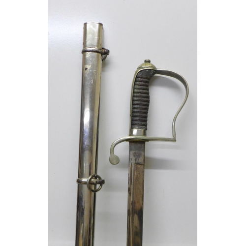 913 - An Infantry officer's sword with scabbard, the grip with crowned cypher, the blade marked Magasin Du... 