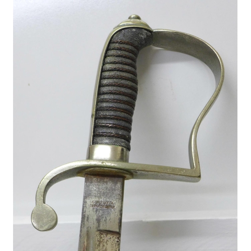 913 - An Infantry officer's sword with scabbard, the grip with crowned cypher, the blade marked Magasin Du... 