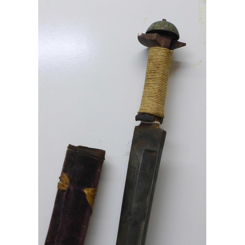 914 - An Indian tulwar, etched blade, lacking hilt, wooden handle a/f, blade 78cm, velvet covered scabbard