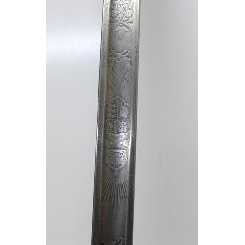 915 - An Edward VII British Infantry dress sword, etched blade, pierced hilt, with leather and metal scabb... 