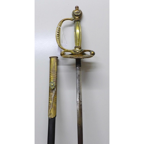 918 - A continental sword with leather and brass scabbard, gilt brass handle, length of blade 79cm