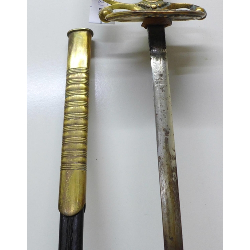 918 - A continental sword with leather and brass scabbard, gilt brass handle, length of blade 79cm