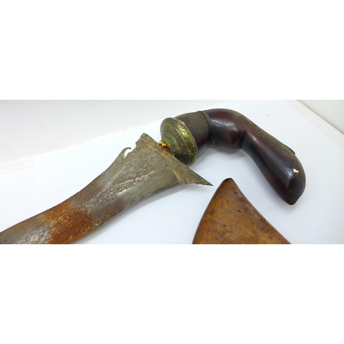 930 - An Indonesian kris with wooden scabbard (scabbard repaired), blade 34cm