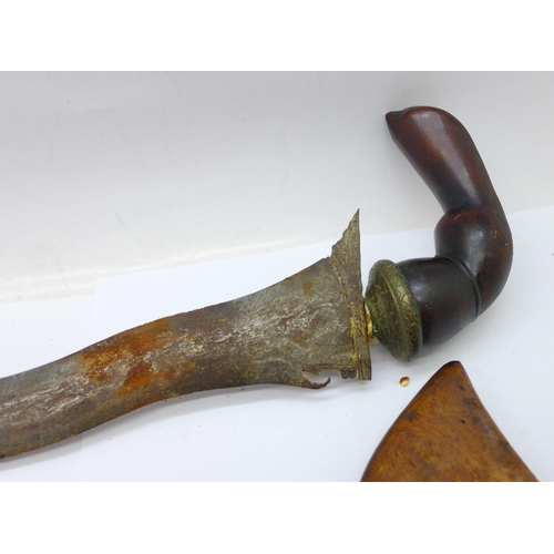 930 - An Indonesian kris with wooden scabbard (scabbard repaired), blade 34cm