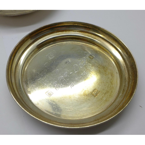 934 - Four silver dishes, one with inscription, total weight 274g