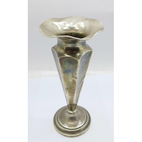 946 - A silver vase, 16cm, some dents around the rim