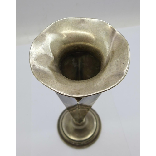 946 - A silver vase, 16cm, some dents around the rim