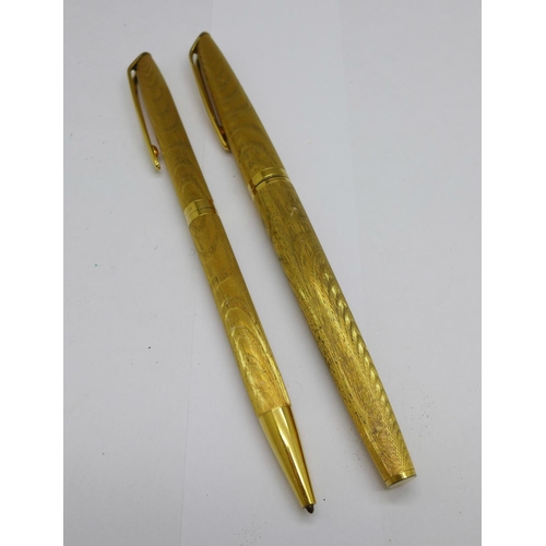 961 - A 1970's Waterman C.F. gold plated fountain pen with 18ct gold nib with matching ballpoint pen