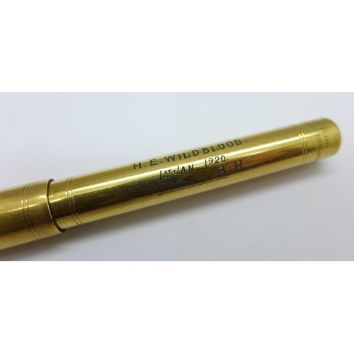 962 - A gold plated Swan pen, with inscription dated 1920, a similar pen with inscription dated 1917 and w... 