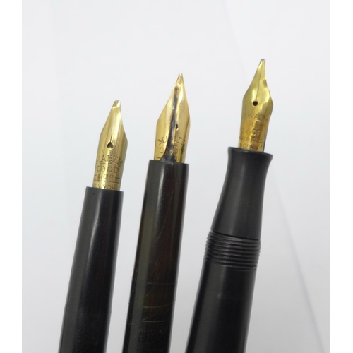 972 - Three pens; Swan Mabie Todd Self-Filling with 14ct gold nib and two The Swan Pen dip pens, each with... 