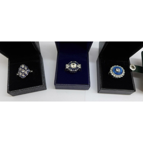 991 - Three Art Deco style dress rings and an enamel ring, K to M