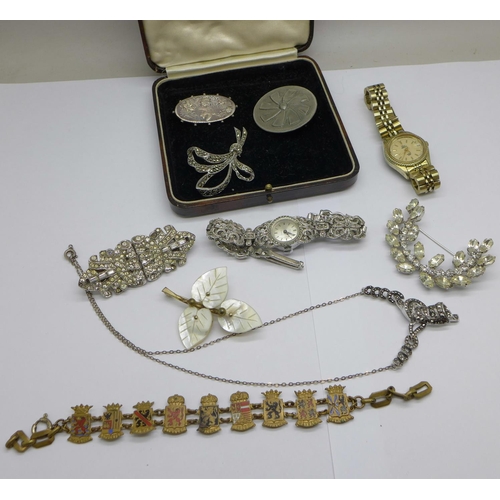 994 - Costume jewellery; two wristwatches, a Victorian silver brooch, other brooches and a bracelet