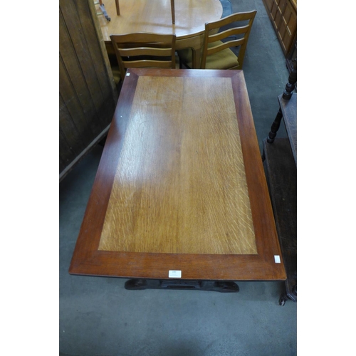 100 - A Victorian Gothic Revival oak library table (later top), 72cms h ,116cms w, 69cms d