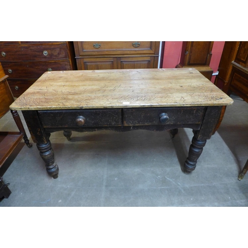 105 - A Victorian pine scrub top two drawer farmhouse kitchen table, 73cms h, 133cms L, 66cms w.