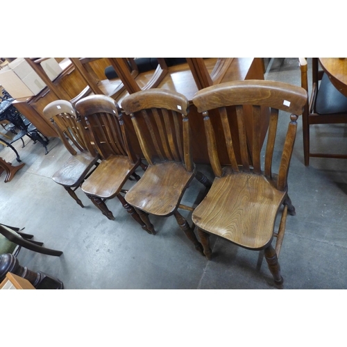 106 - A set of four Victorian elm and beech kitchen chairs