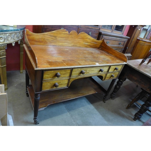 107 - A George IV mahogany five drawer writing desk, attributed to Gillows of Lancaster, 98cms h, 122cms w... 