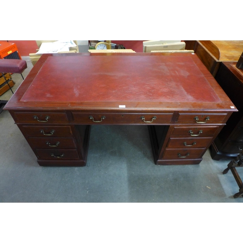 110 - An Edward VII mahogany library desk, 74cms h, 152cms w, 83cms d.