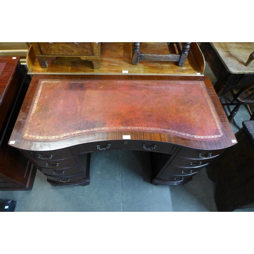 118 - A mahogany kneehole desk, 76cms h, 120cms w, 56cms d.