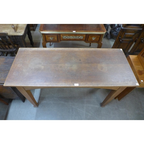 120 - An Arts and Crafts oak altar table, 86cms h, 130cms L, 53cms w.