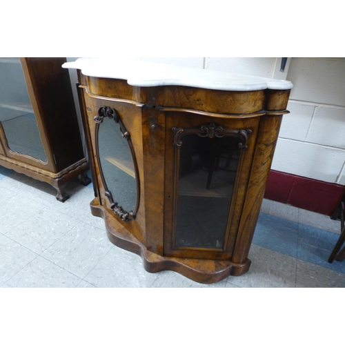 123 - A Victorian burr walnut and marble topped serpentine credenza, 88cms h, 122cms w, 41cms d.