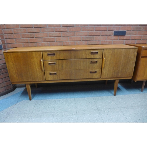 126 - A Beautility teak sideboard