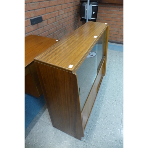 131 - A pair of teak bookcases