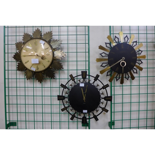 143a - Two vintage Metamec wall clocks and another