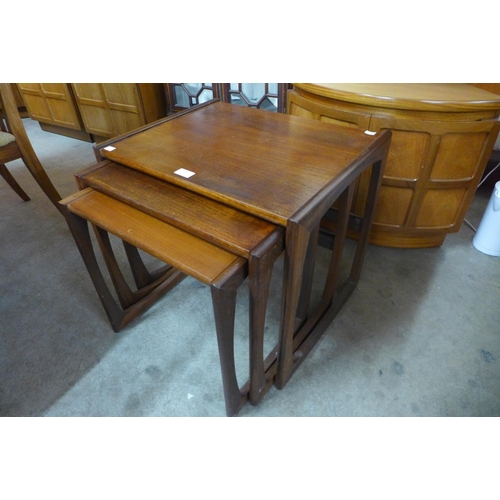 144 - A teak nest of tables