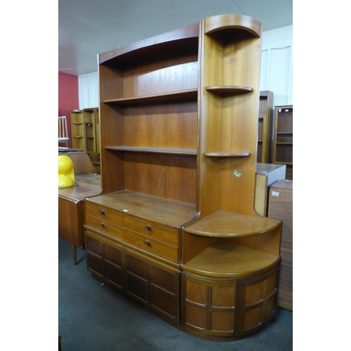 147 - A Nathan teak bookcase and matching corner cabinet