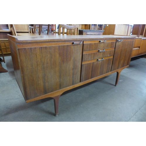 153 - An afromosia sideboard