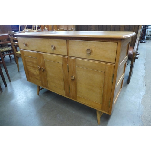 165 - An Ercol Blonde elm and beech sideboard