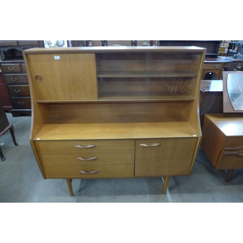 168 - An Avalon teak highboard