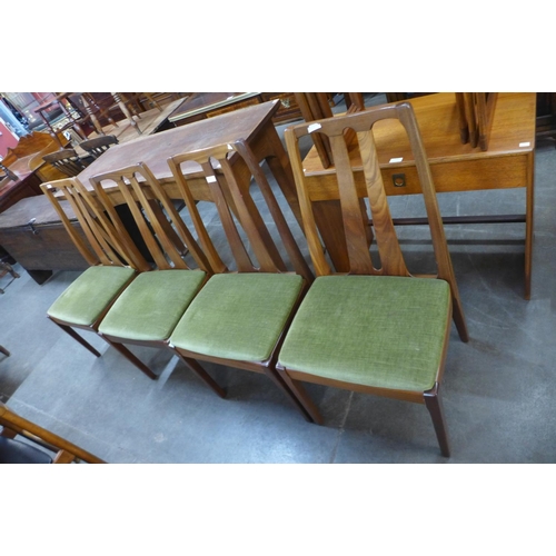 174 - A set of four Nathan teak dining chairs