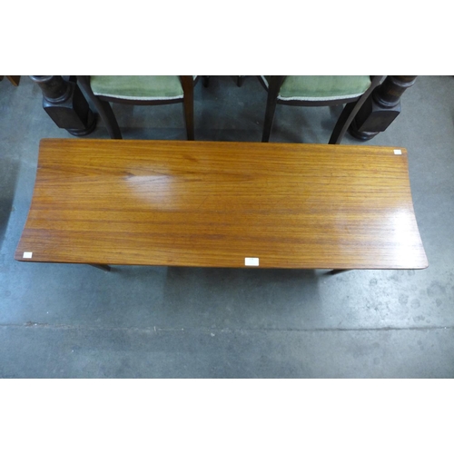 178 - A teak coffee table with concave ends by Richard Hornby