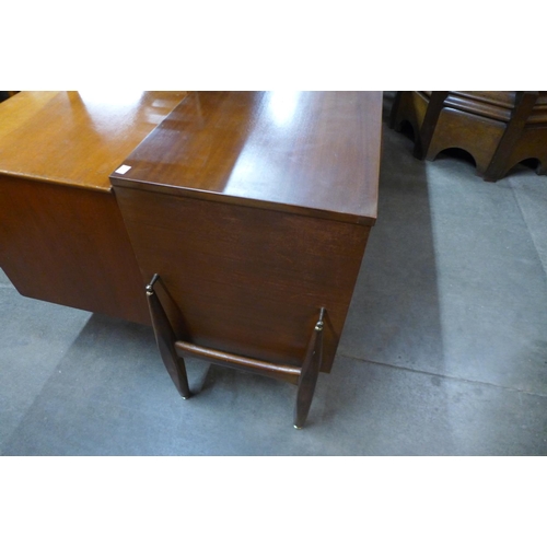 181 - A teak and afromosia sideboard