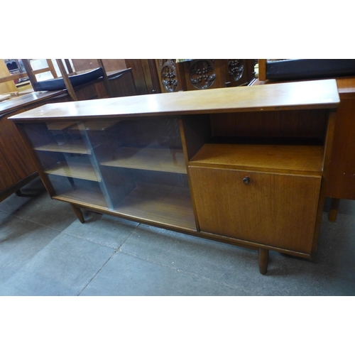 182 - A teak bookcase