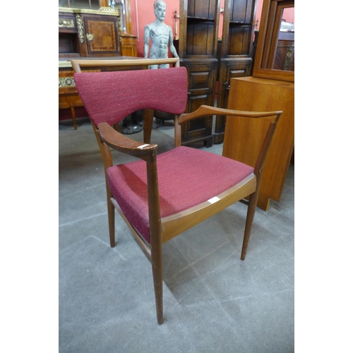 188 - A teak and upholstered open armchair