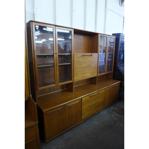 197 - A large teak wall unit