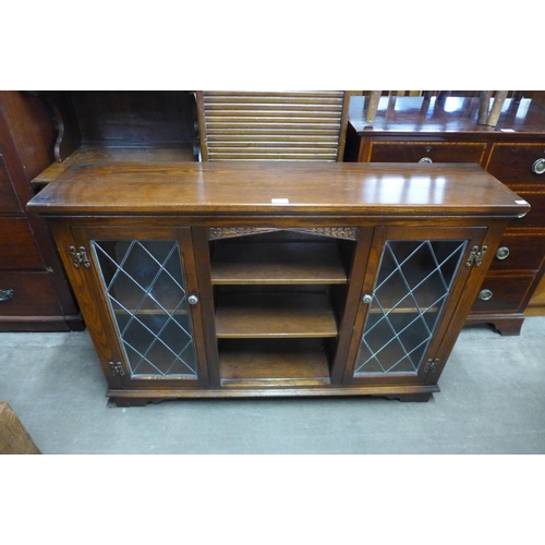 208 - An Old Charm oak two door bookcase