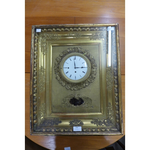 209 - A 19th Century French three train musical wall clock, with silk suspension