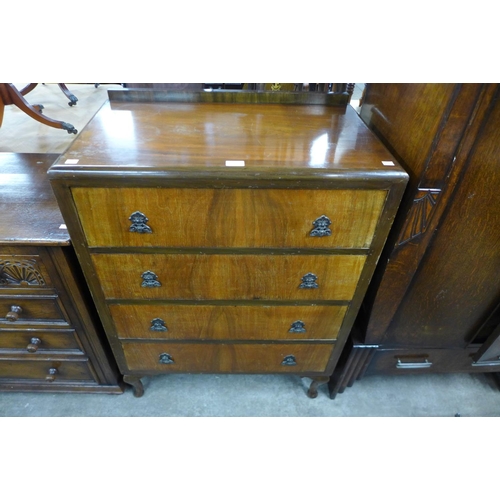 216 - A walnut chest of drawers