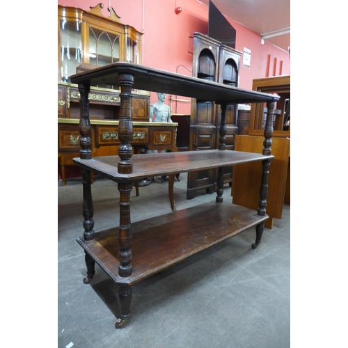 217 - A Victorian oak three tier dumb waiter