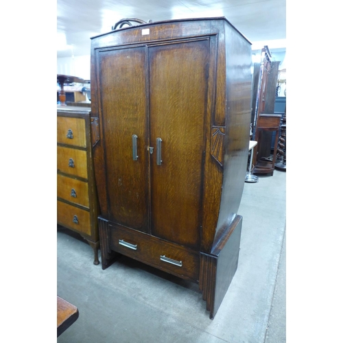 218 - An Art Deco oak tallboy